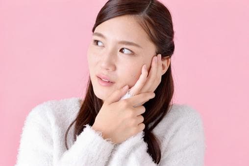 顎関節症になった女性